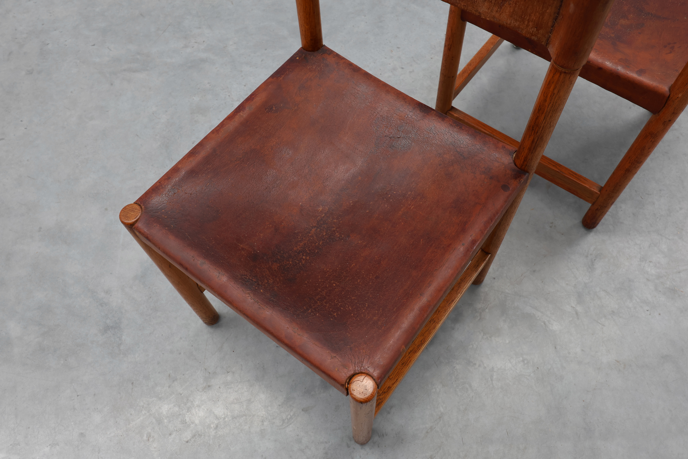 Pair of wood and leather Spanish chairs by Jordi Vilanova, ca. 1960thumbnail